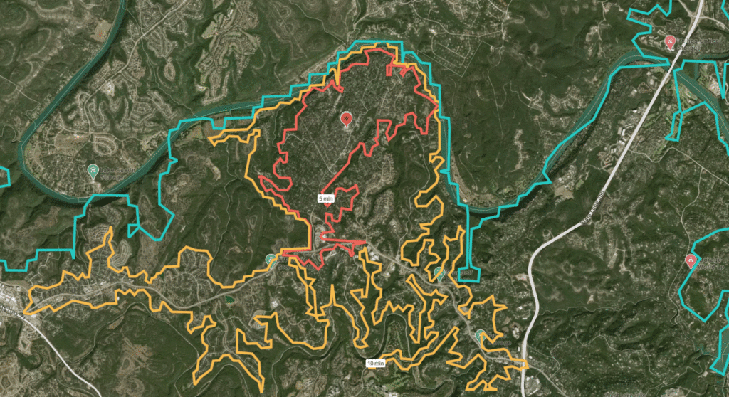 Map comparing drive-time zones (5, 10, 20 minutes) with radius analysis to highlight access restrictions caused by natural barriers
